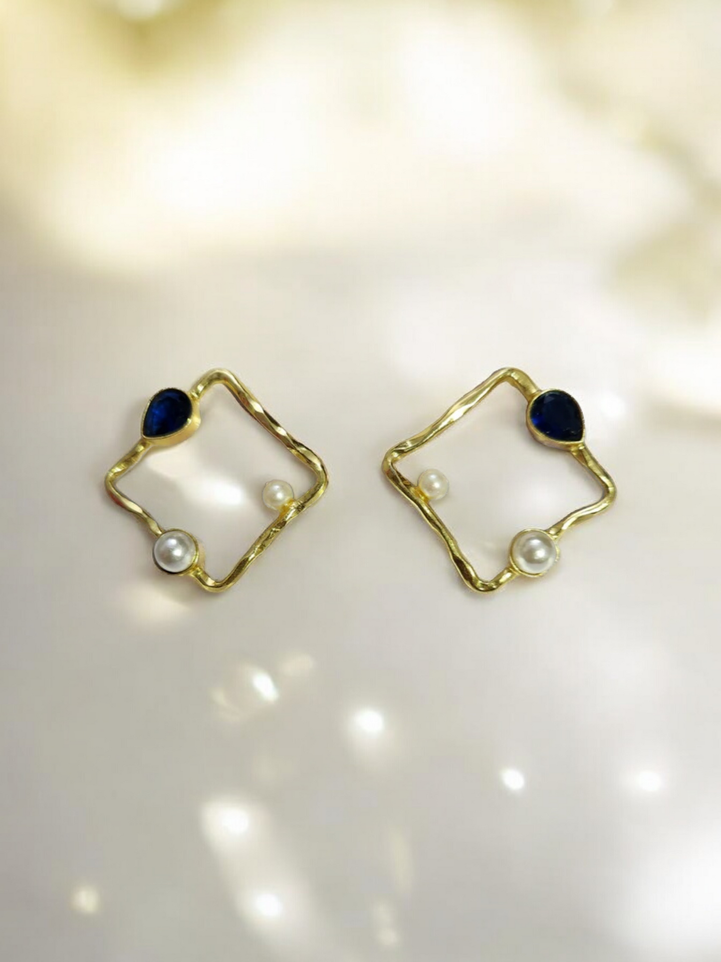 Blue stone diamond shaped earrings