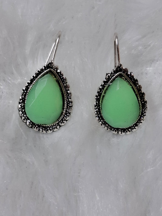 Silver tone earrings Green
